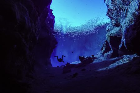 Dive into the deep-sea wonder of the mysterious and often dangerous Silfra, Iceland